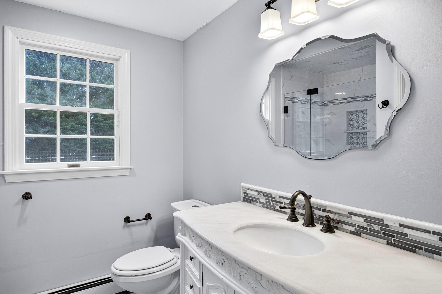 30 Fox Crossing Road Brewster, MA 02631 - Photo 27 of 36 a bathroom with a sink and a mirror