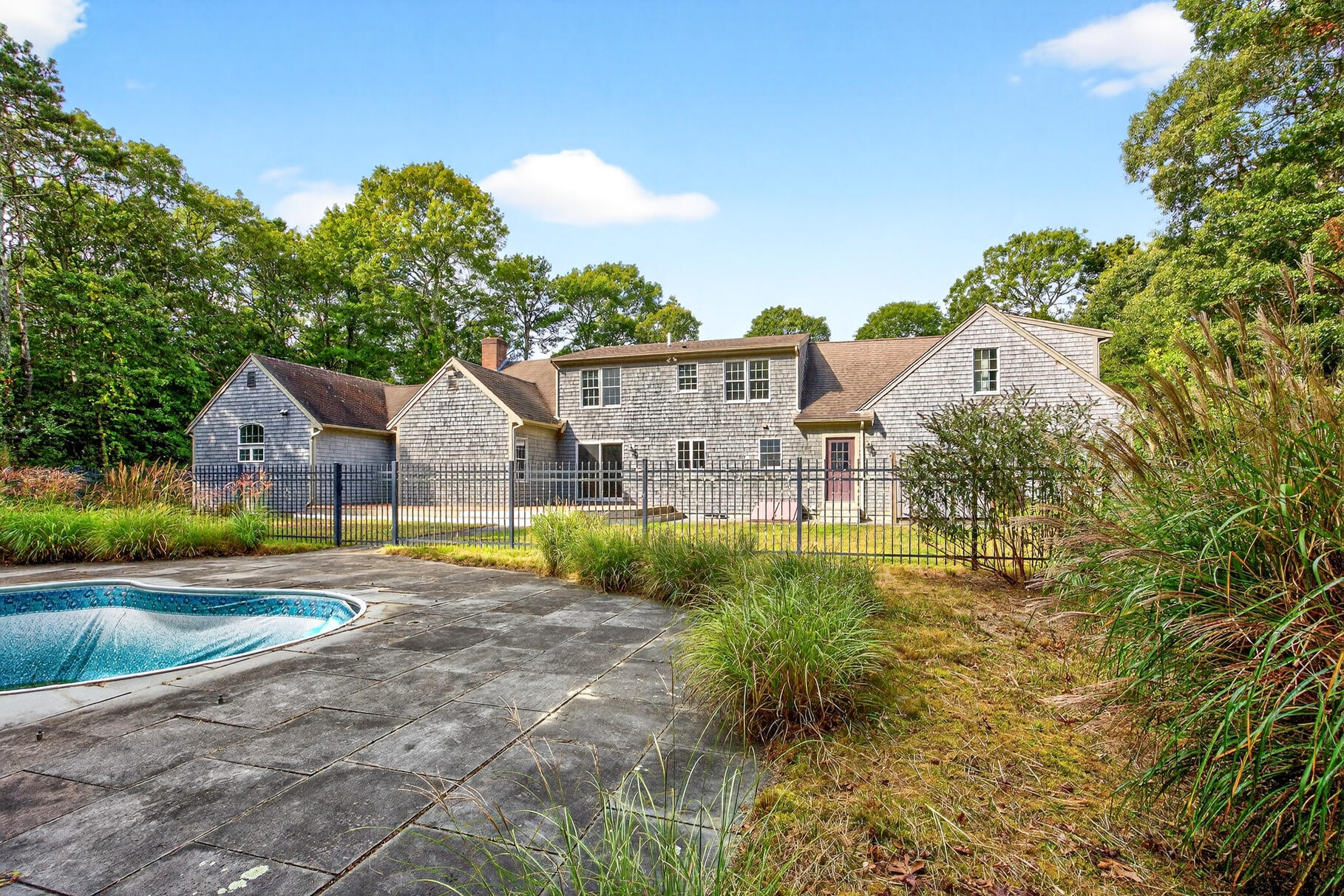 30 Fox Crossing Road Brewster, MA 02631 - Photo 8 of 36 a view of house with yard and outdoor seating