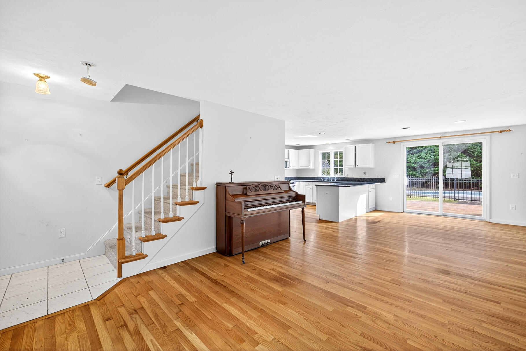 30 Fox Crossing Road Brewster, MA 02631 - Photo 10 of 36 a kitchen with stainless steel appliances wooden floor and a large window