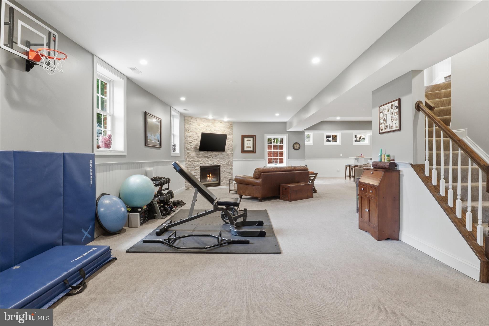 6441 Highway 193 McLean, VA 22101 - Photo 56 of 85 Basement Rec Room with Stacked Stone Fireplace
