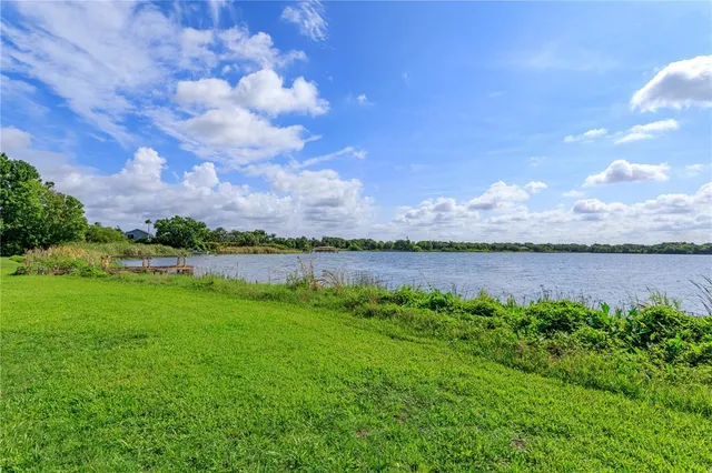 a view of a lake from a yard