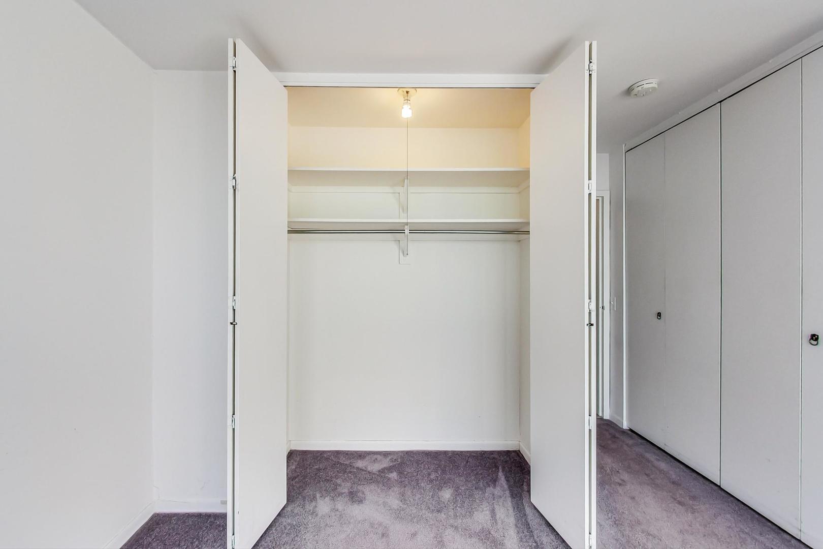 5415 North Sheridan Road, Unit 2904 Chicago, IL 60640 - Photo 32 of 49 a view of an empty walk in closet