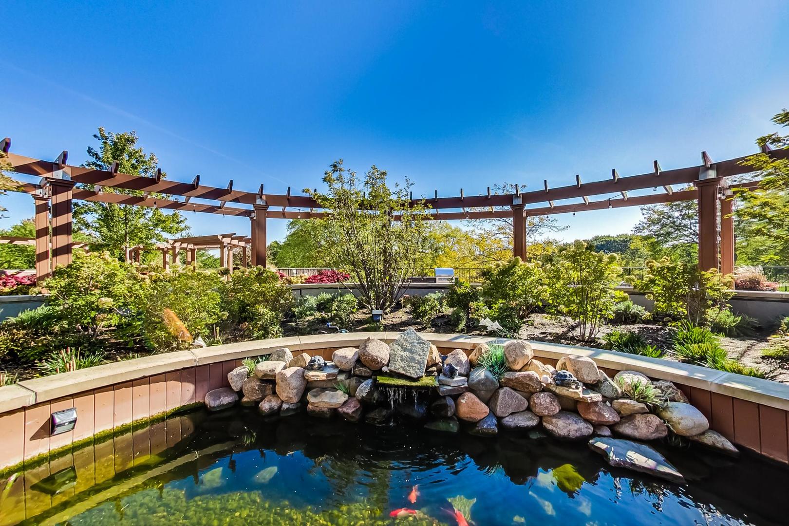 5415 North Sheridan Road, Unit 2904 Chicago, IL 60640 - Photo 38 of 49 a view of a balcony with many potted plants