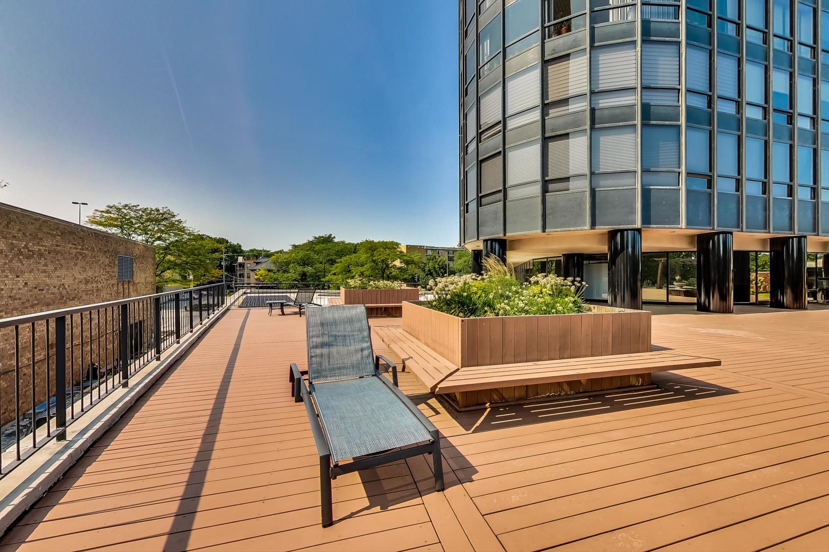 5415 North Sheridan Road, Unit 2904 Chicago, IL 60640 - Photo 42 of 49 a view of building with seating space and city view