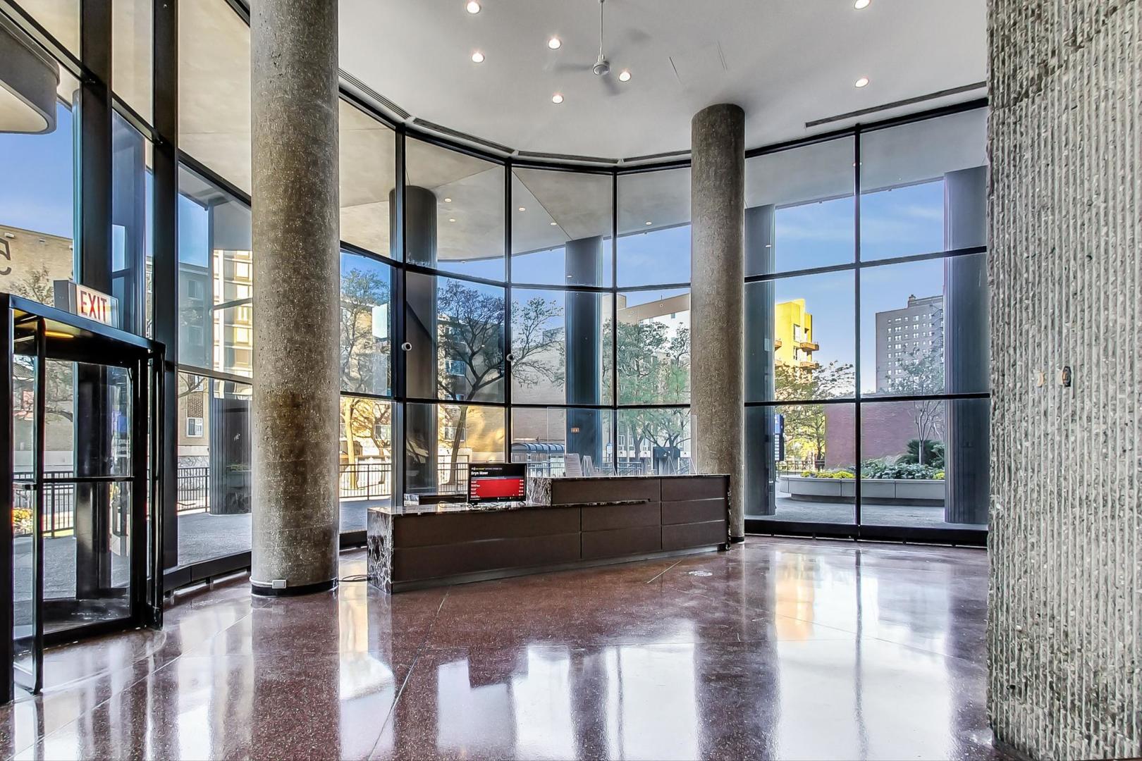 5415 North Sheridan Road, Unit 2904 Chicago, IL 60640 - Photo 8 of 49 a view of hall with stairs