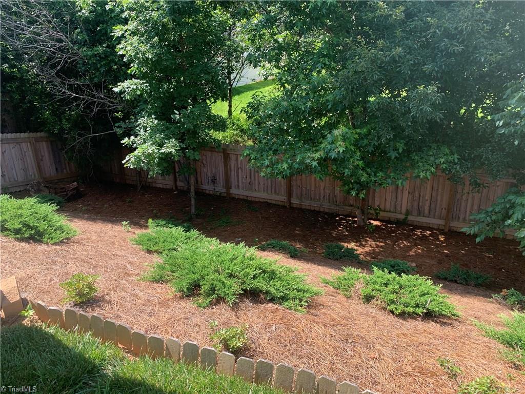6468 Bentbrush Street Rural Hall, NC 27045 - Photo 18 of 23 Park like setting in back yard adds to privacy.