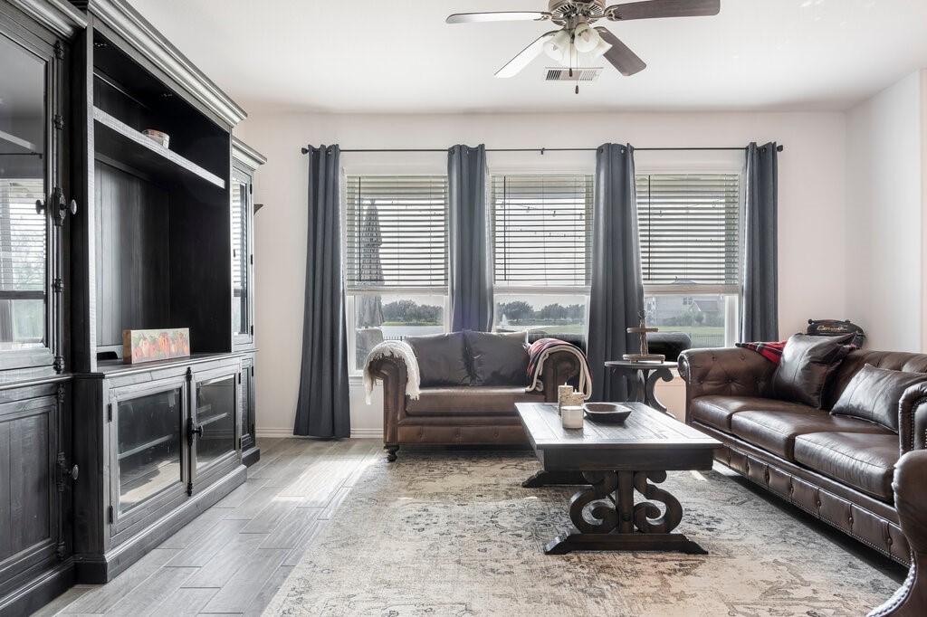 105 Montecito Lane Manvel, TX 77578 - Photo 21 of 39 a living room with furniture and floor to ceiling window