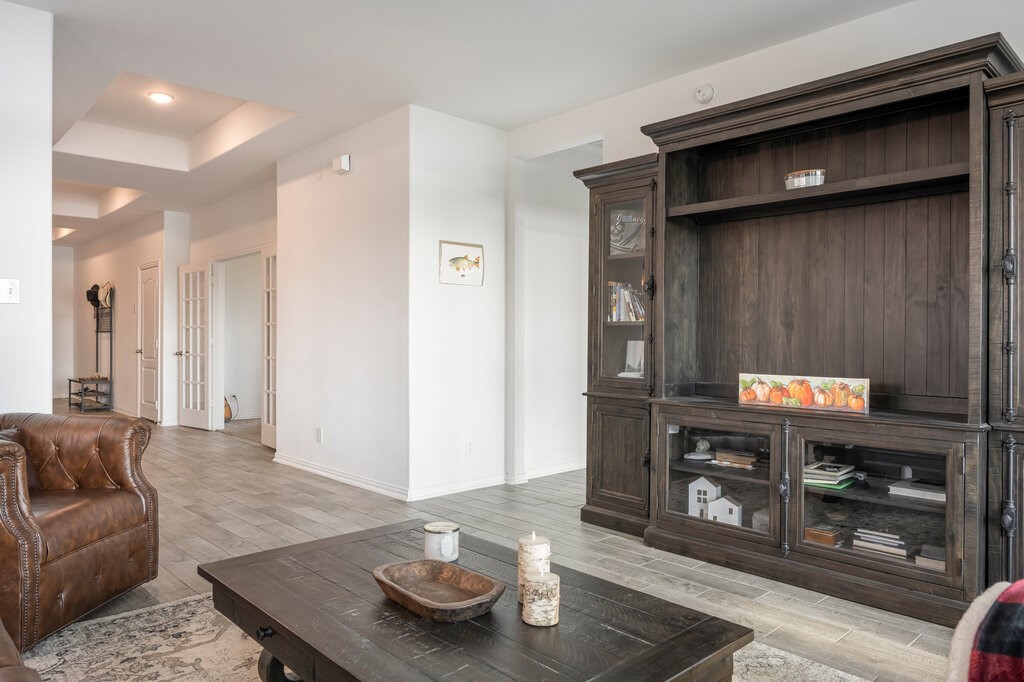 105 Montecito Lane Manvel, TX 77578 - Photo 22 of 39 a living room with furniture and wooden floor