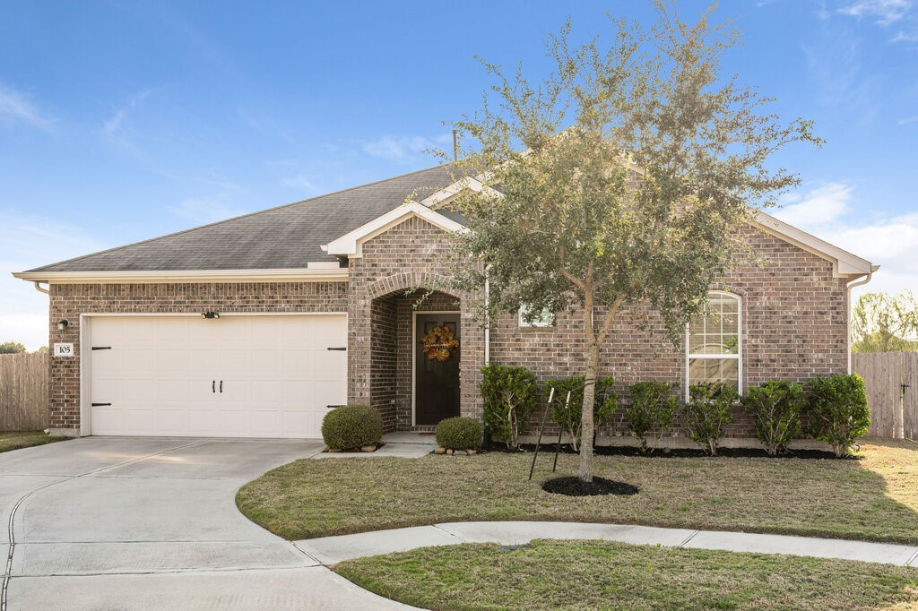 105 Montecito Lane Manvel, TX 77578 - Photo 3 of 39 a front view of a house with porch