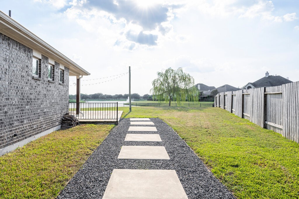 105 Montecito Lane Manvel, TX 77578 - Photo 6 of 39 a view of a backyard with swimming pool