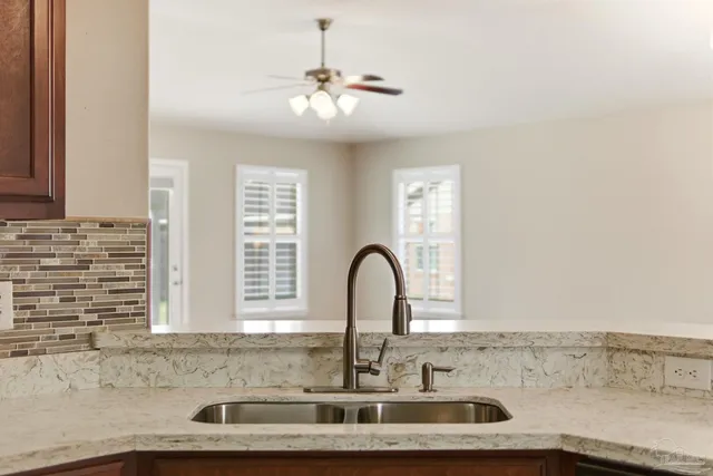 a close view of a sink and a faucet in a bathroom