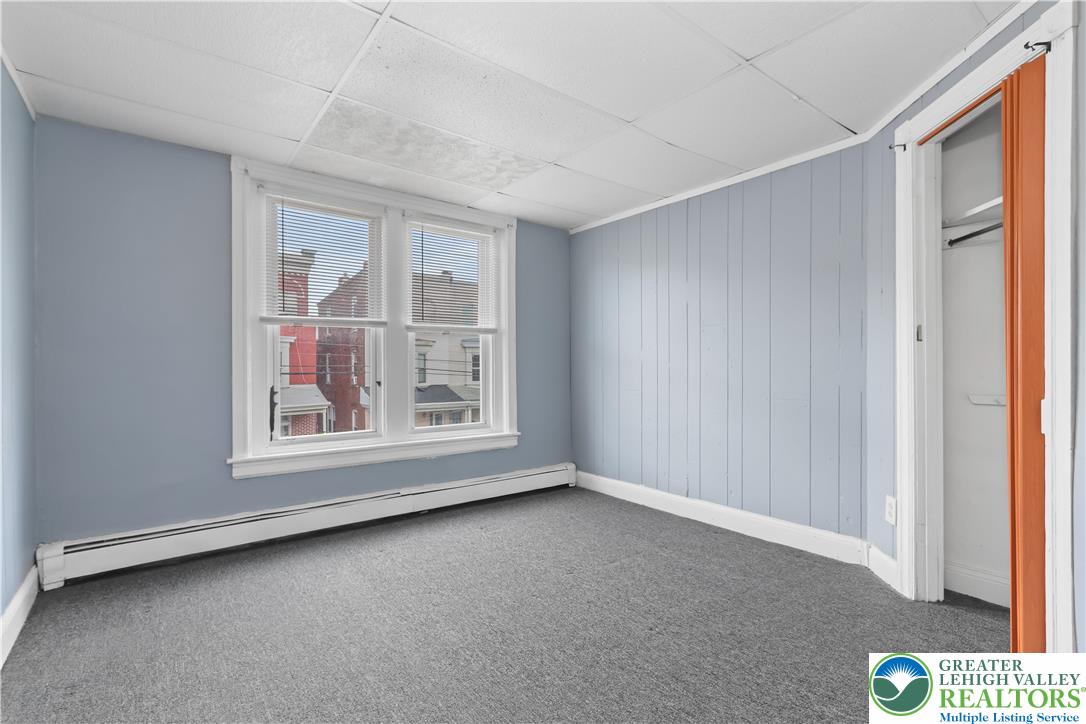 424 Cedar Street Allentown, PA 18102 - Photo 13 of 27 a view of an empty room with a window