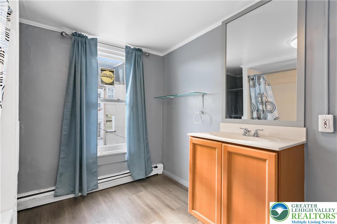 424 Cedar Street Allentown, PA 18102 - Photo 18 of 27 a kitchen with stainless steel appliances granite countertop a refrigerator and a sink