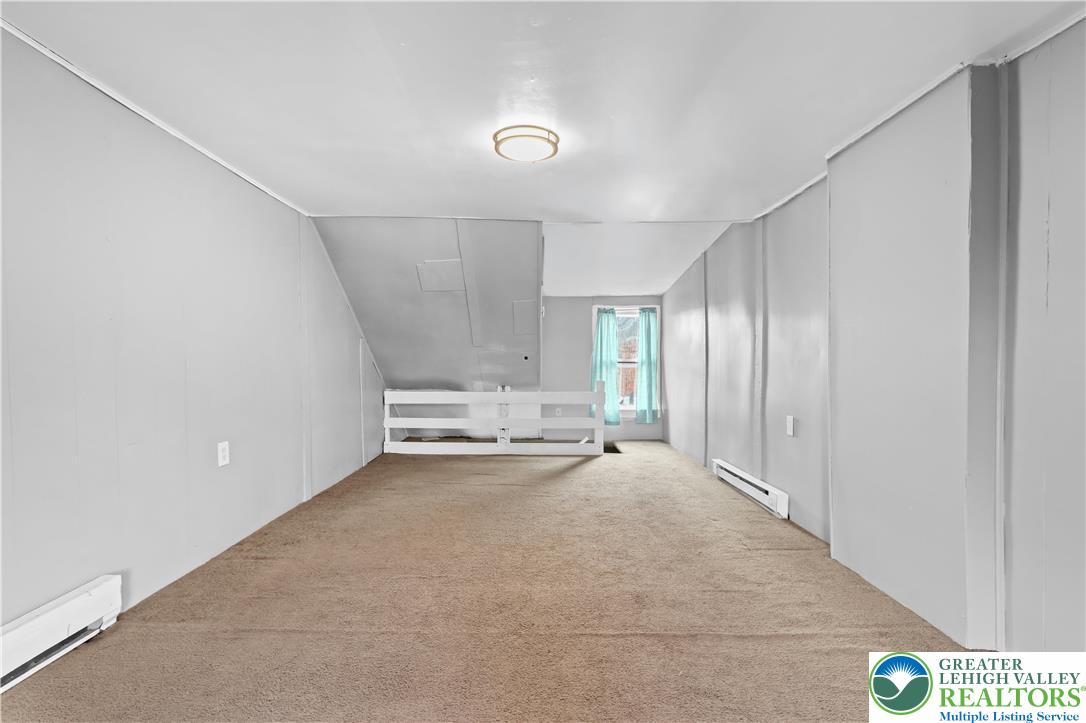 424 Cedar Street Allentown, PA 18102 - Photo 22 of 27 a view of an empty room with a window