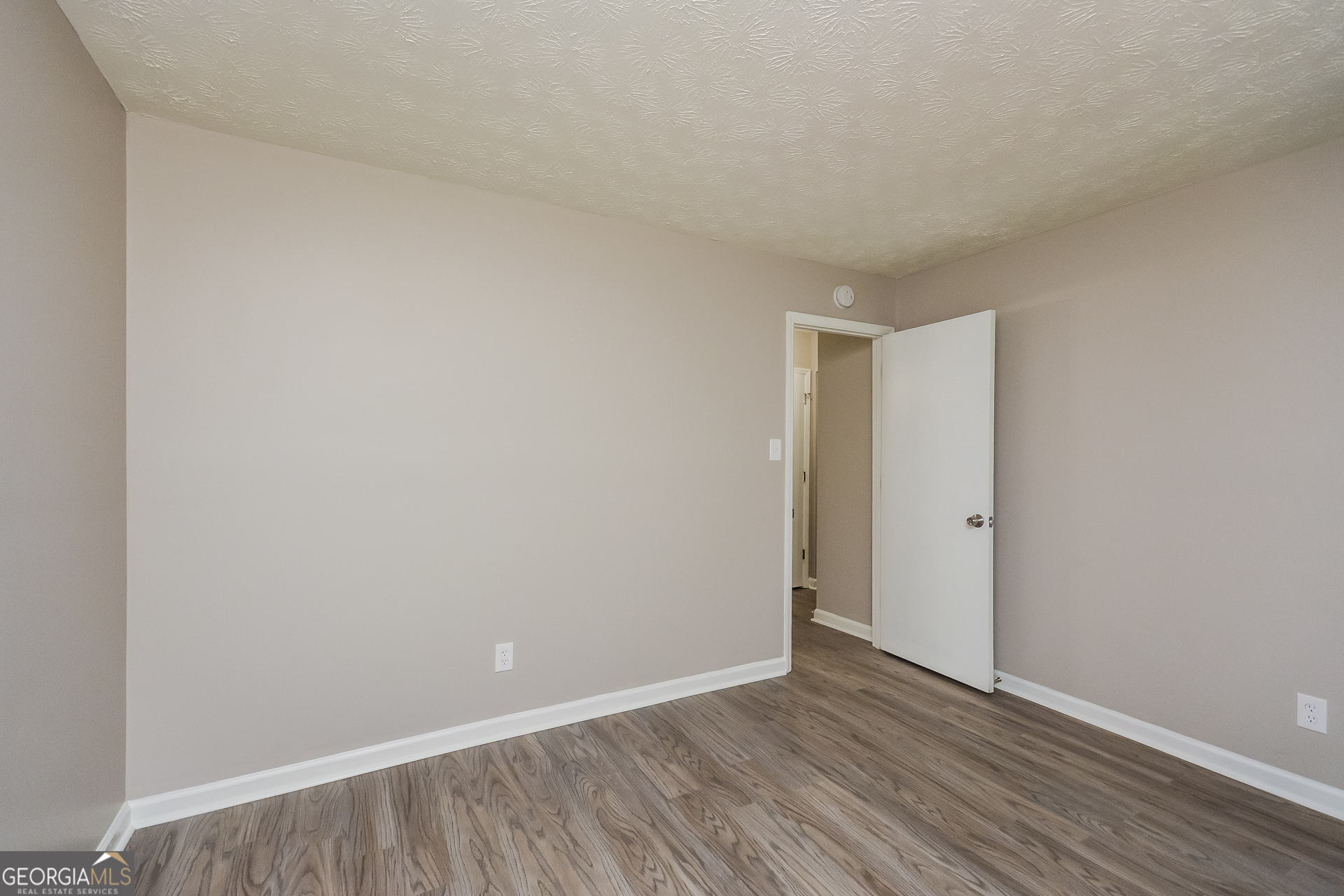 4585 Old Lake Drive Decatur, GA 30034 - Photo 12 of 16 a view of an empty room and wooden floor