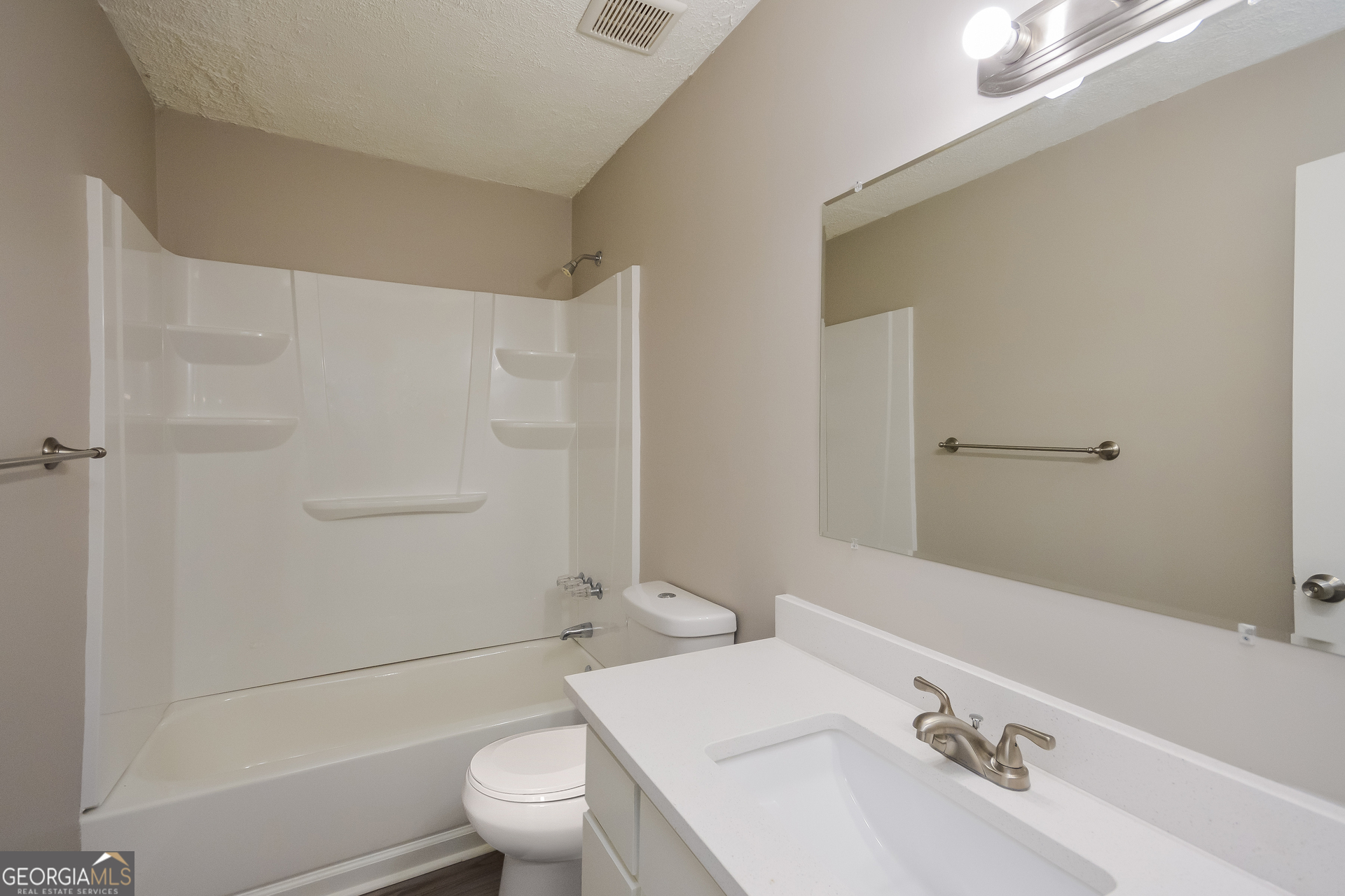 4585 Old Lake Drive Decatur, GA 30034 - Photo 14 of 16 a bathroom with a sink a toilet and shower