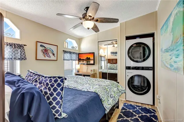 an aerial view of a house a garden potted plants and a kitchen view