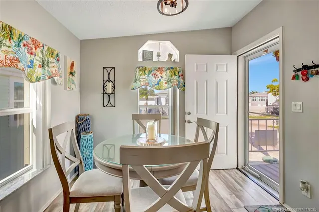 a kitchen with stainless steel appliances a stove refrigerator sink and cabinets