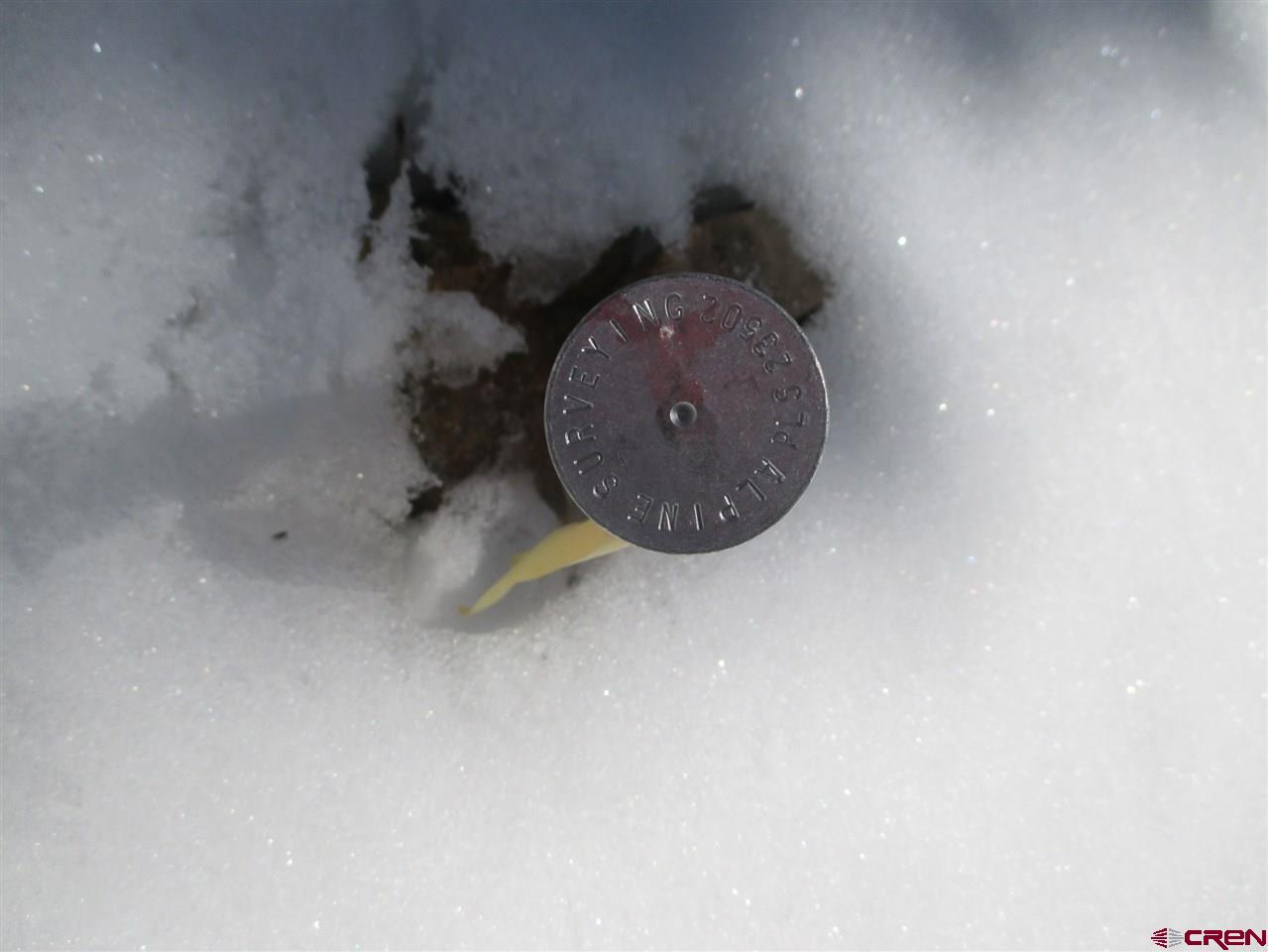 1400 Slumgullion Road Lake City, CO 81235 - Photo 25 of 35 an aerial view of a fireplace in room