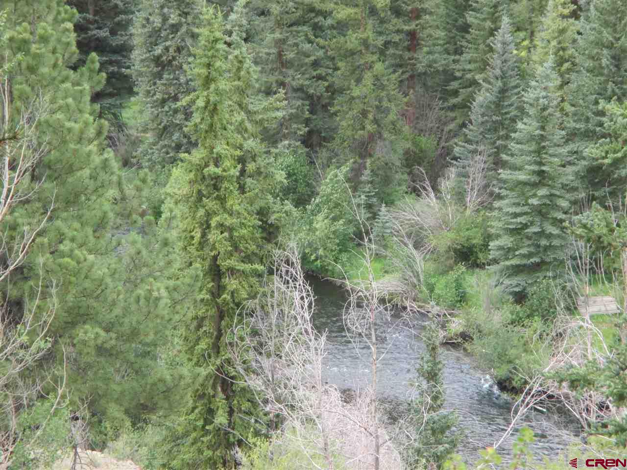 1400 Slumgullion Road Lake City, CO 81235 - Photo 30 of 35 a view of a forest with lots of trees