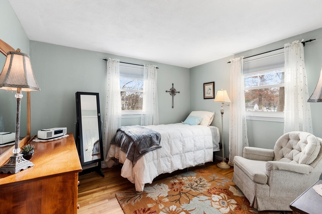 19 Dustin Young Lane Billerica, MA 01821 - Photo 17 of 37 a bedroom with a bed and a couch