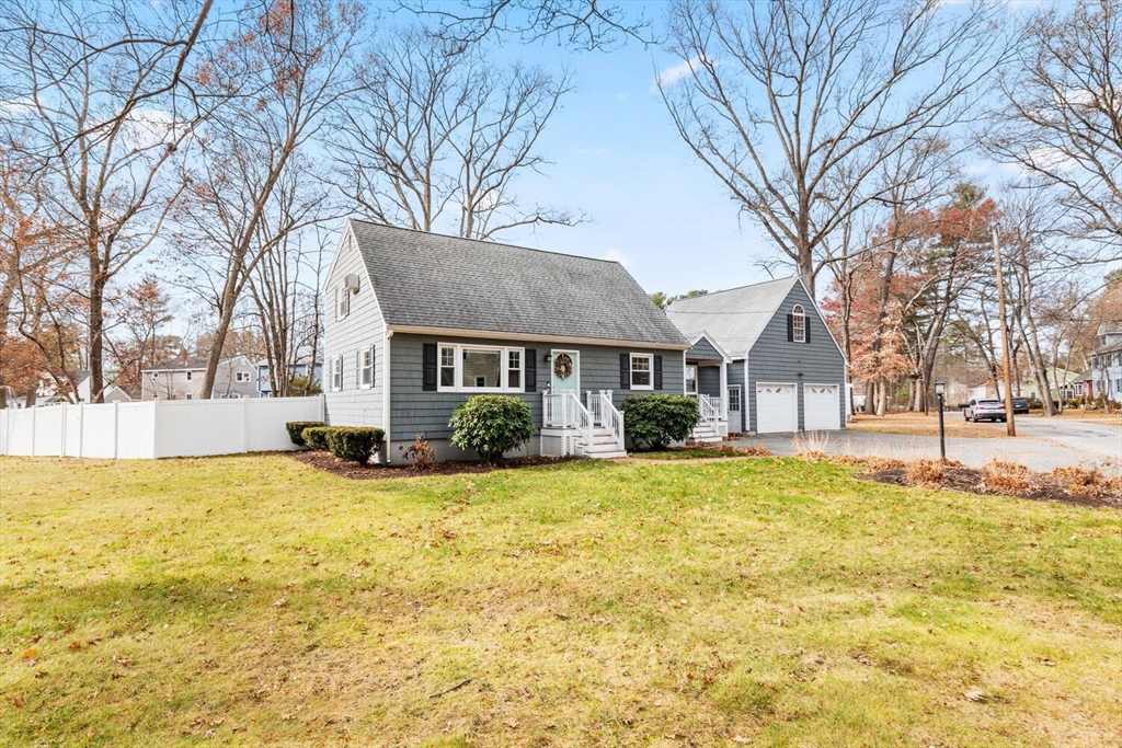 19 Dustin Young Lane Billerica, MA 01821 - Photo 2 of 37 a view of house with yard and trees in the background