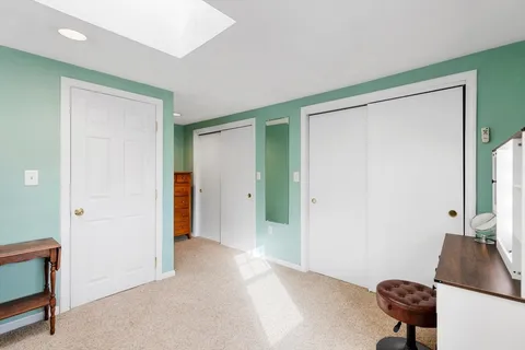 a workspace with furniture and a window