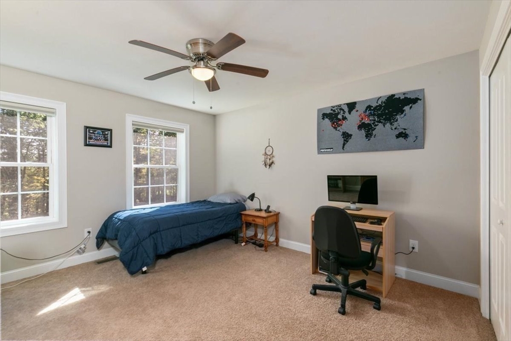 135 Pepperell Road Groton, MA 01450 - Photo 22 of 41 a bedroom with a workspace