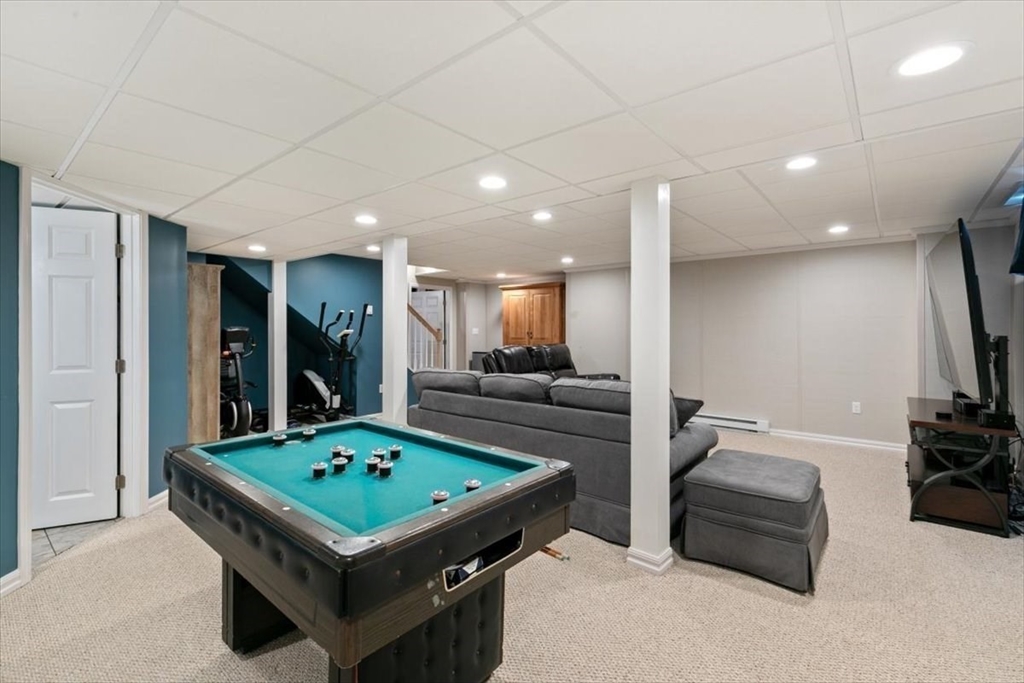 135 Pepperell Road Groton, MA 01450 - Photo 31 of 41 a room with furniture pool table flat screen tv and windows