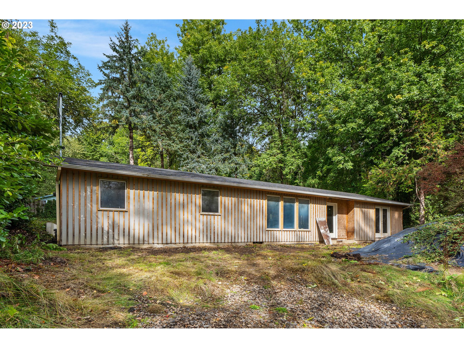 15370 Twin Fir Road Lake Oswego, OR 97035 - Photo 2 of 19 a view front of house with backyard and trees