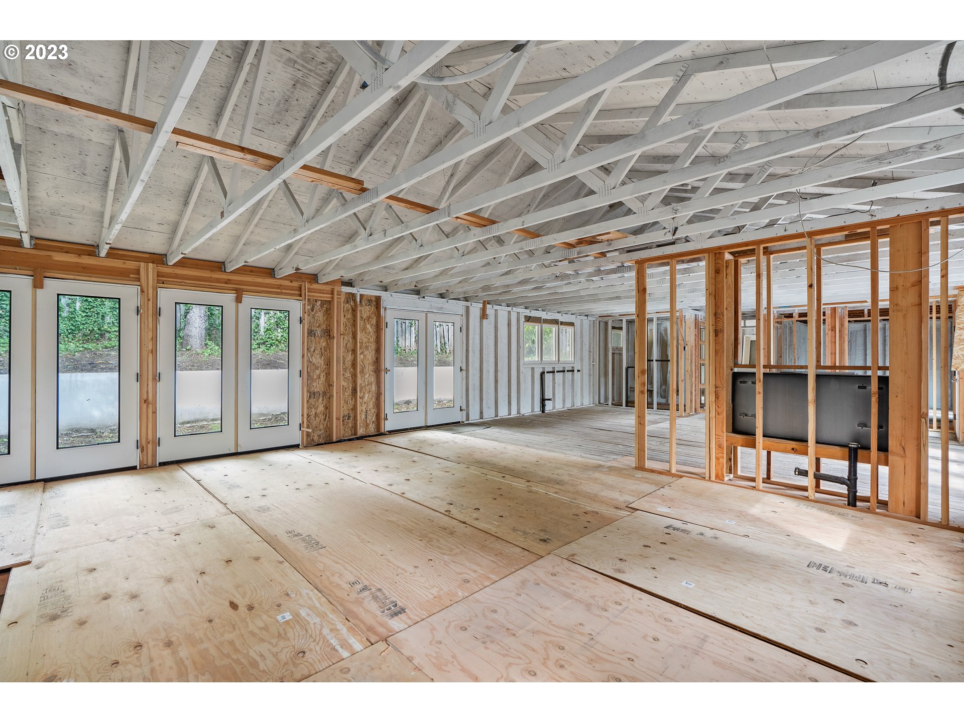 15370 Twin Fir Road Lake Oswego, OR 97035 - Photo 8 of 19 a view of an empty room with a balcony