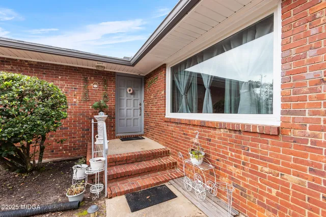 a view of a house with a porch