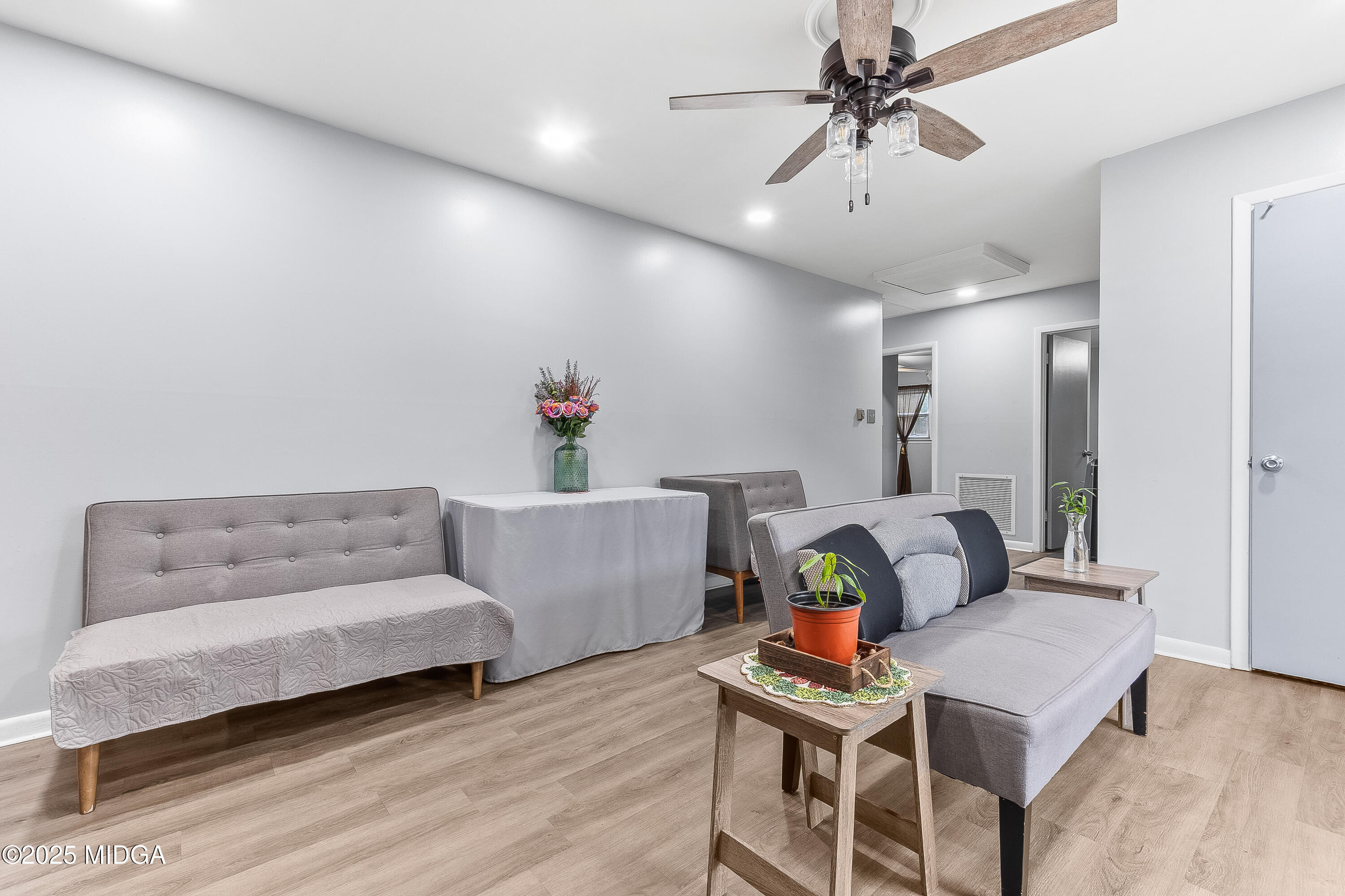 121 Crestwood Road Warner Robins, GA 31093 - Photo 27 of 47 a living room with furniture and wooden floor