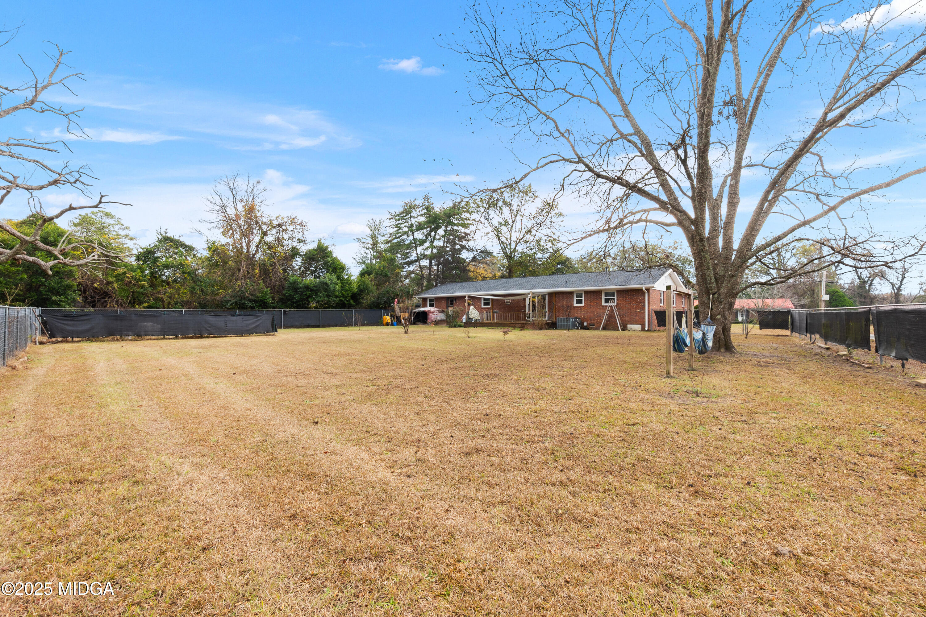 121 Crestwood Road Warner Robins, GA 31093 - Photo 41 of 47 a front view of a house with a yard