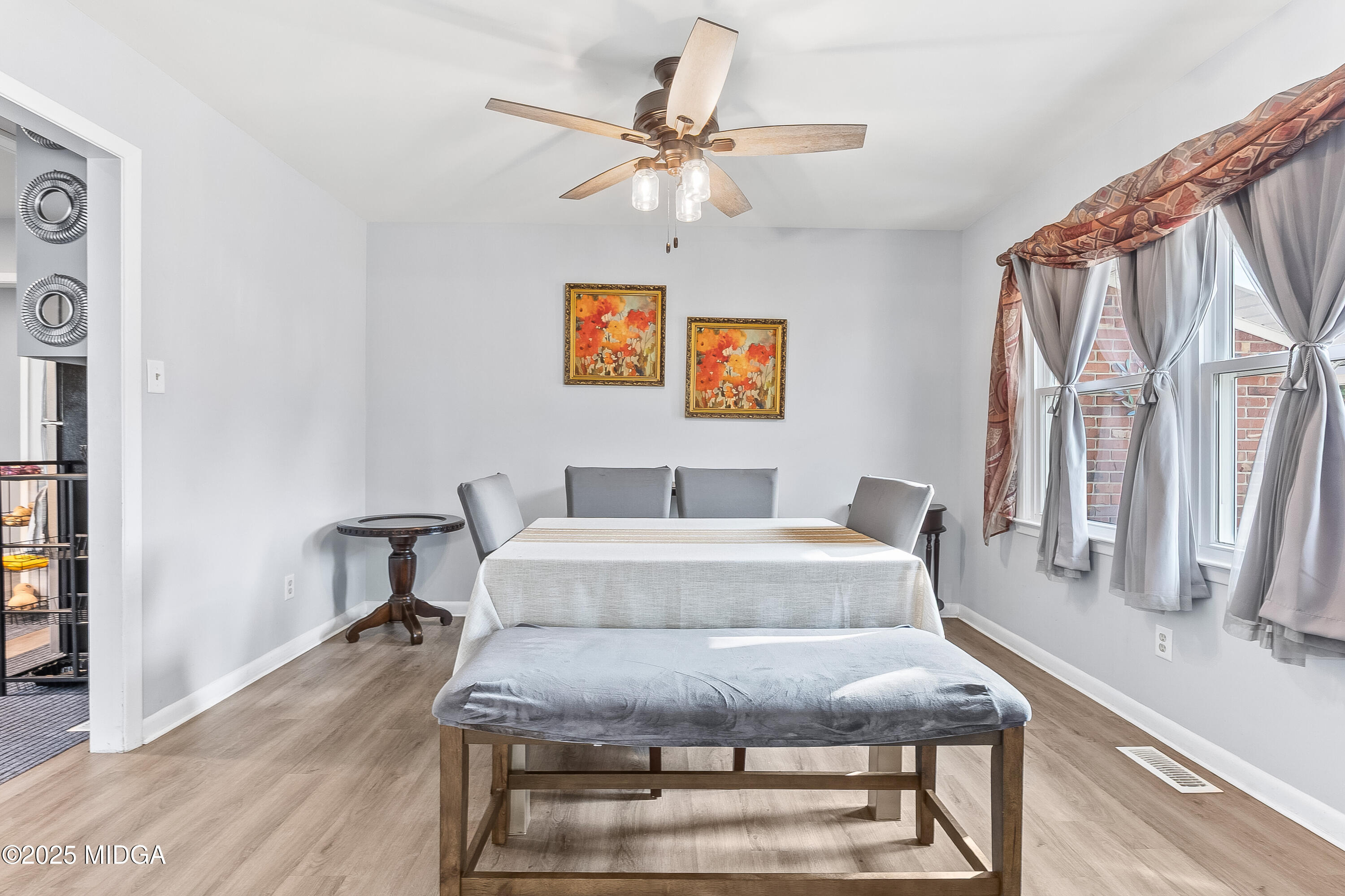 121 Crestwood Road Warner Robins, GA 31093 - Photo 7 of 47 a living room with furniture and a table