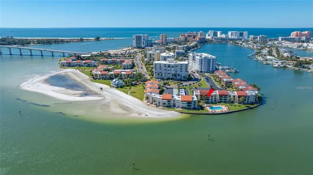 a view of an ocean with a house