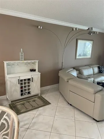 a living room with a couch and a table