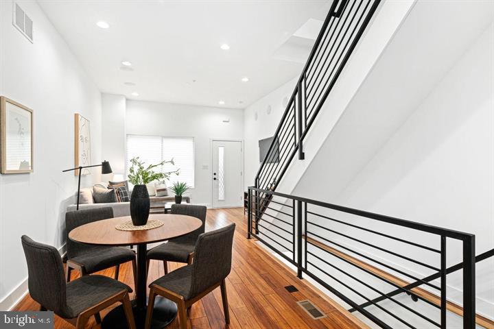 2322 Mutter Street Philadelphia, PA 19133 - Photo 17 of 34 a dining room with furniture and wooden floor