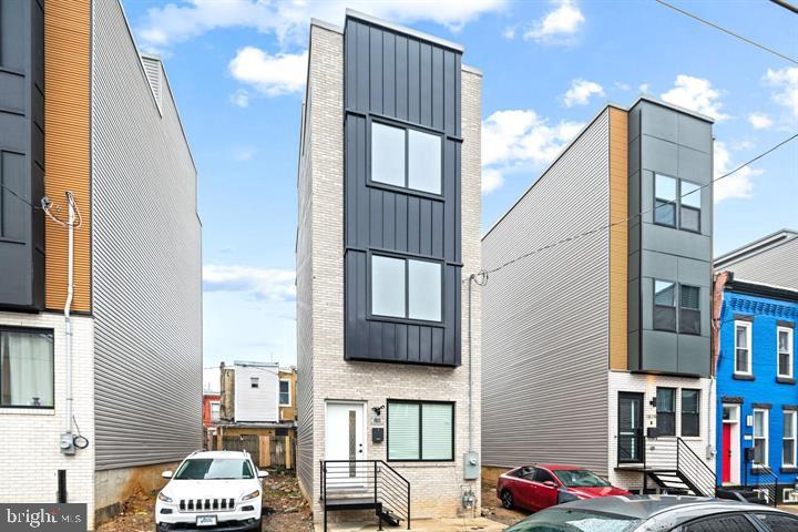 2322 Mutter Street Philadelphia, PA 19133 - Photo 34 of 34 a front view of a building with many windows