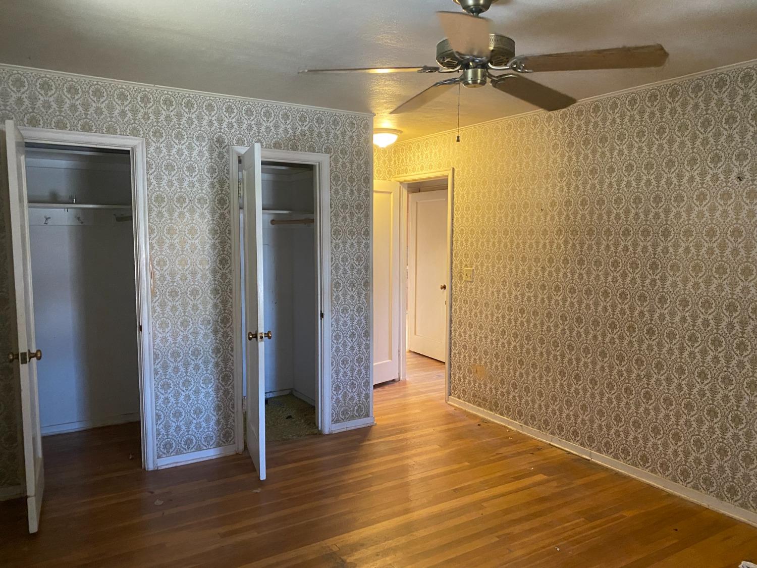2828 E Street Selma, CA 93662 - Photo 15 of 17 wooden floor in an empty room
