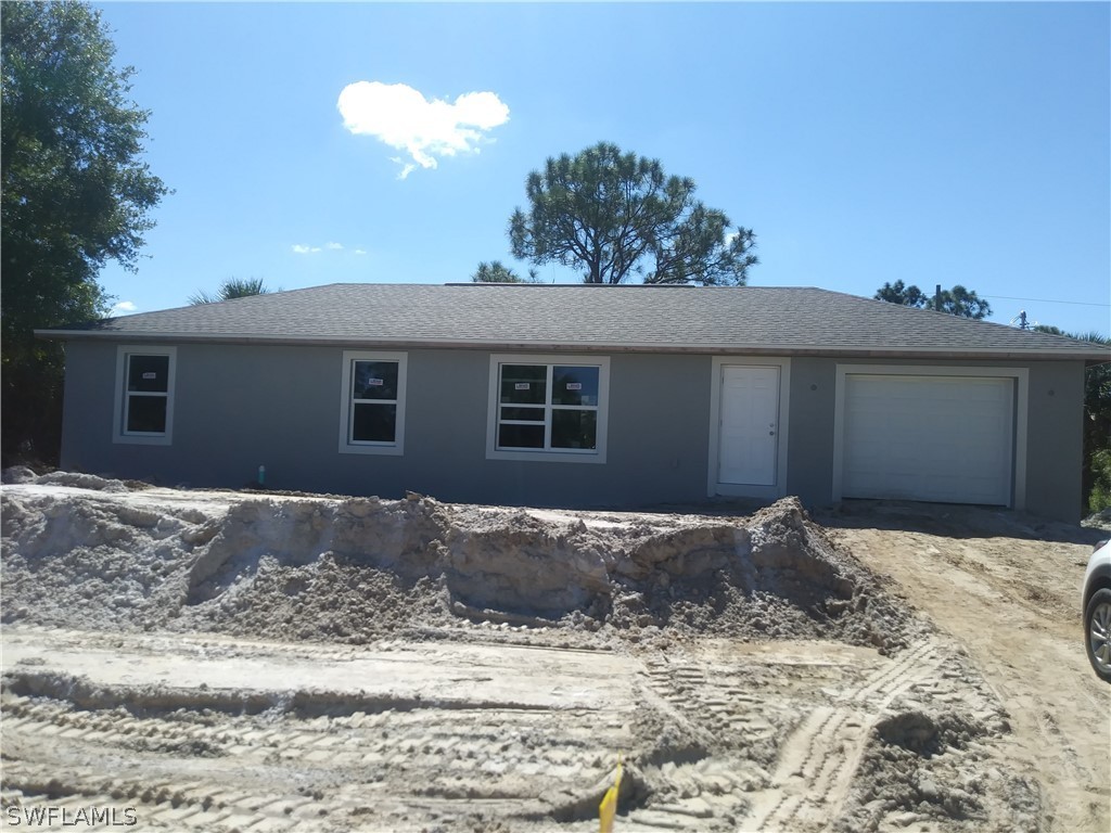 26259 Angelica Road Punta Gorda, FL 33955 - Photo 1 of 8 a front view of a house
