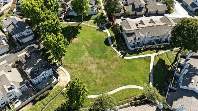 an aerial view of a city with lots of residential buildings