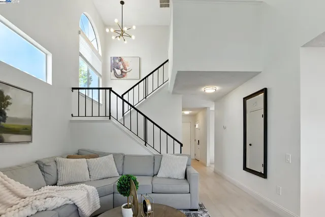 a view of livingroom with furniture and stairs