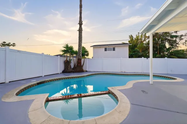 a view of a backyard with plants