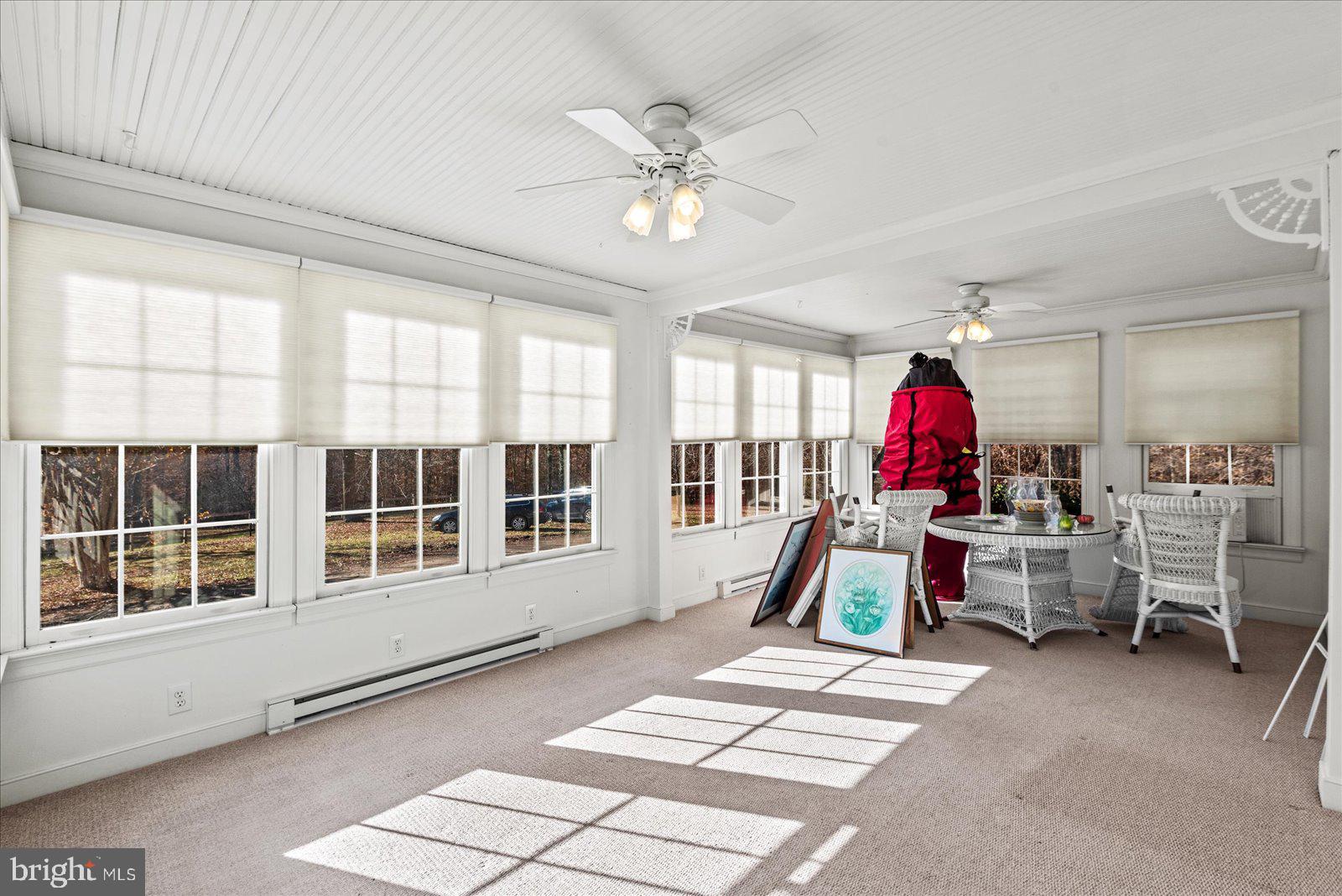 316 Copper Line Road Bumpass, VA 23024 - Photo 60 of 77 Sunroom with views of the pond