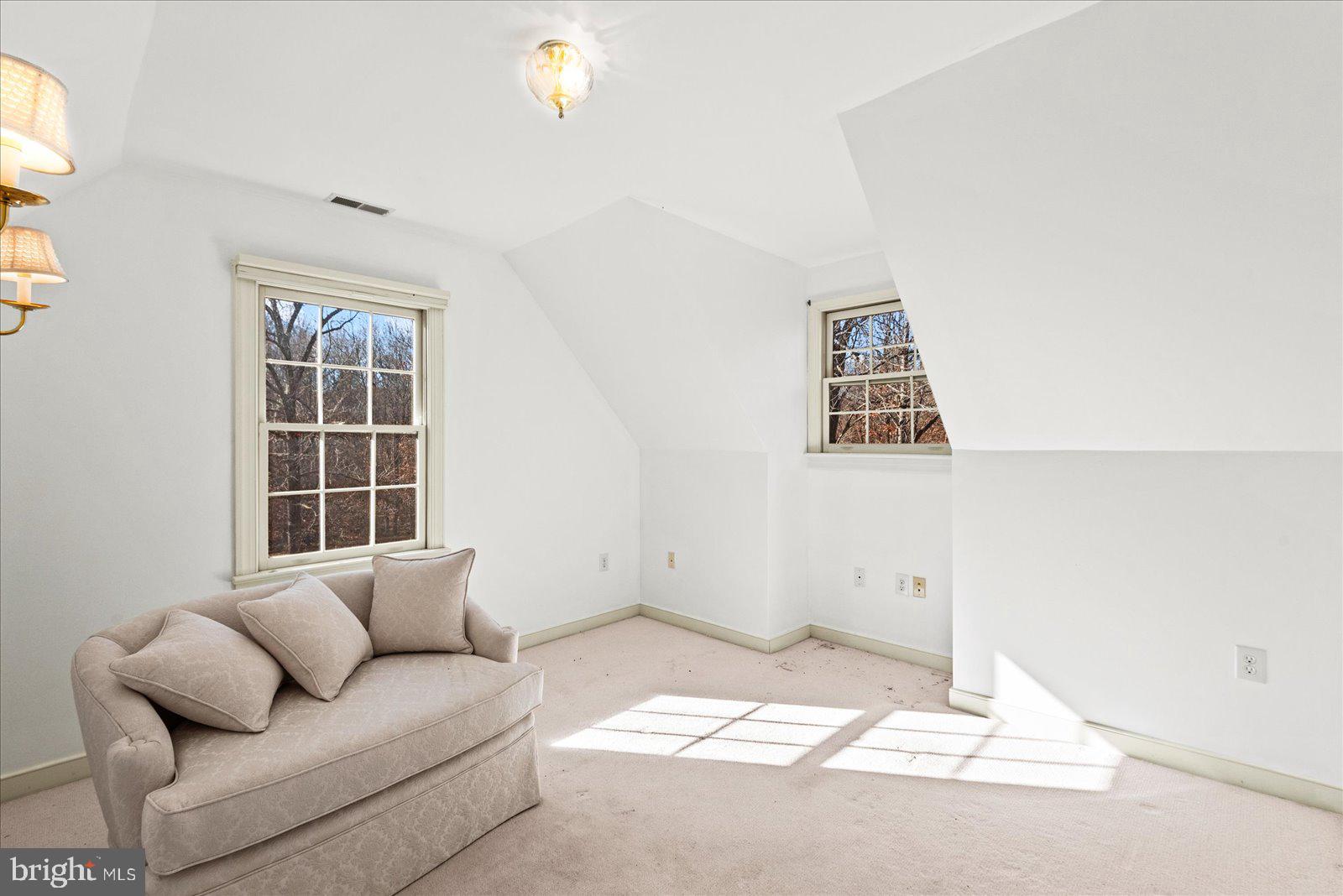 316 Copper Line Road Bumpass, VA 23024 - Photo 68 of 77 a living room with furniture and a window