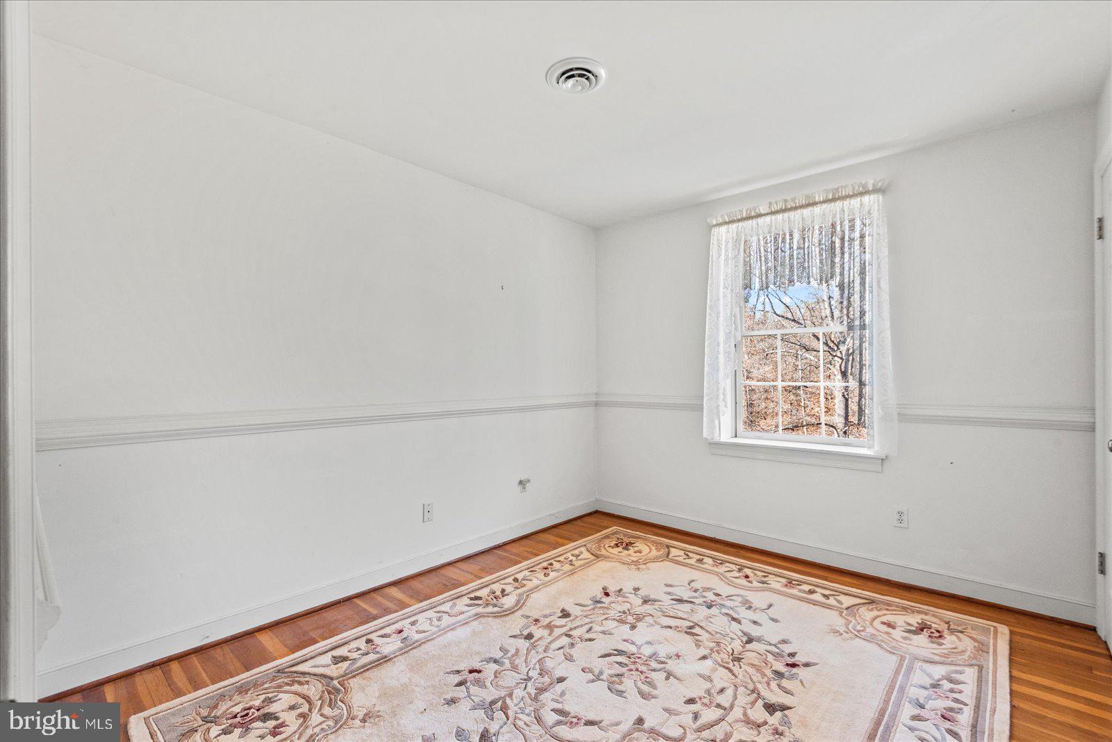 316 Copper Line Road Bumpass, VA 23024 - Photo 70 of 77 a view of a room with window and closet