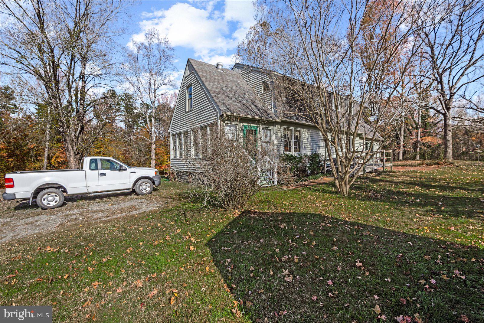 316 Copper Line Road Bumpass, VA 23024 - Photo 8 of 77 a view of a house with a yard