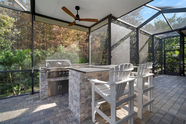 a view of a kitchen with a stove and a microwave