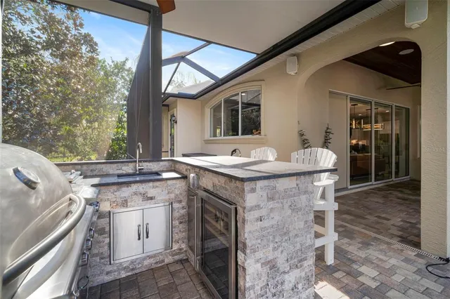 a view of a patio with a table chairs and a patio
